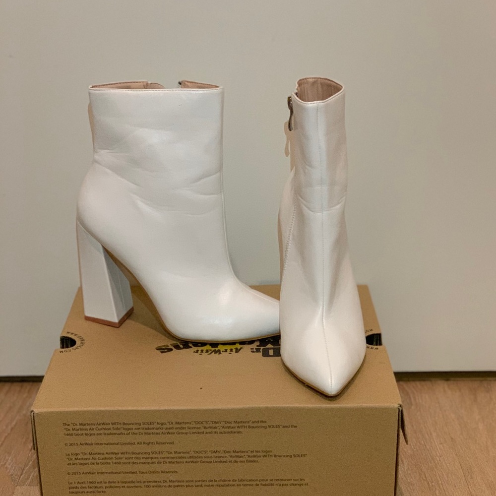 White block heeled booties.